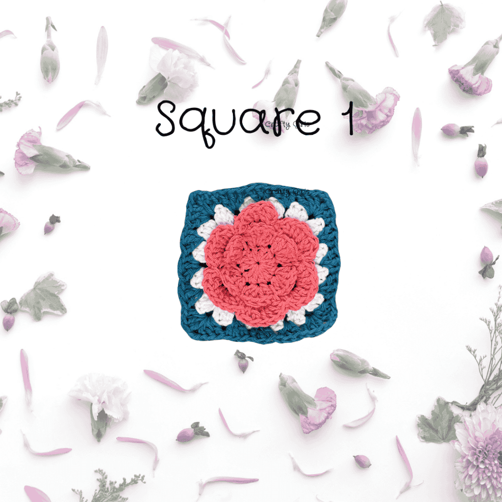 Crocheted pink flower framed inside a granny square of blue and white.
